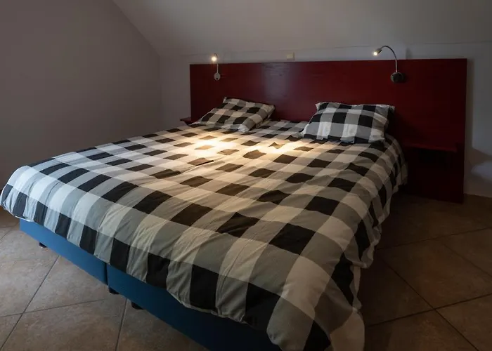 De Blauwe Reiger Couette-café *